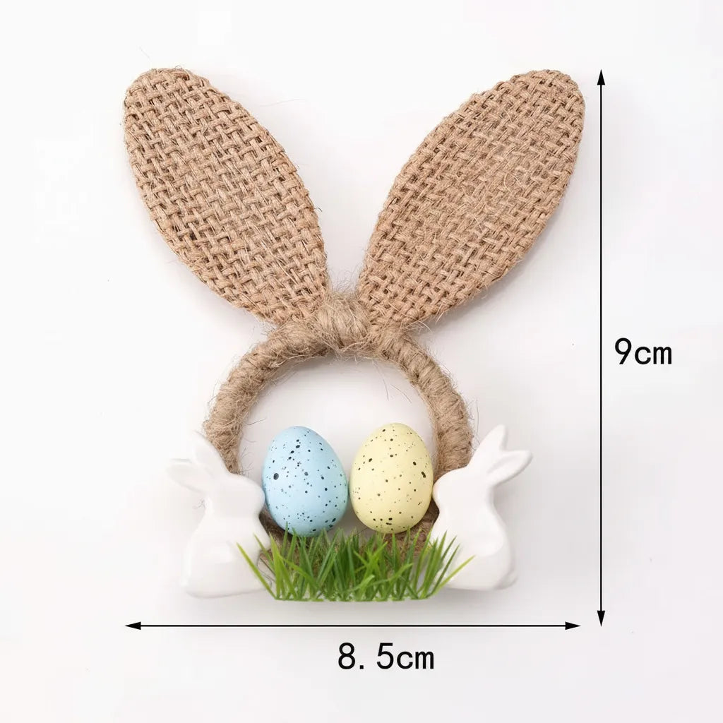 "Anel de guardanapo de coelho em juta isolado em fundo branco com medidas de 9cm."