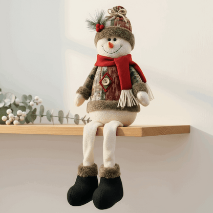 boneco de neve sentado em prateleira com botas pretas