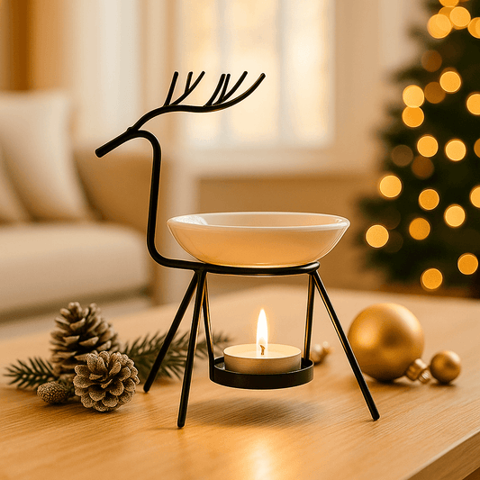 difusor rena com vela acesa em mesa com pinhas e esferas douradas