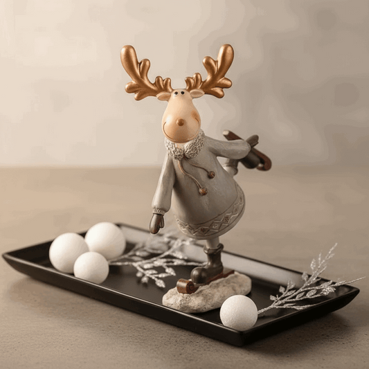 estatueta rena patinadora em resina sobre bandeja decorativa